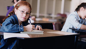 student at desk working